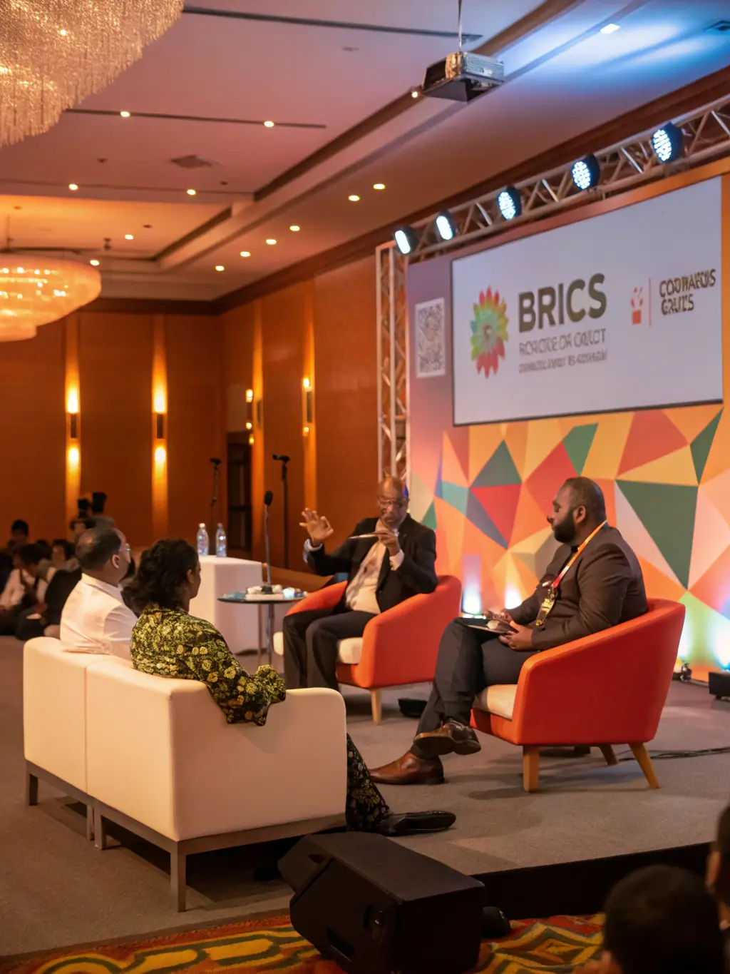 A vibrant photograph of a conference in London, showcasing a panel discussion with three speakers on stage, the audience is attentively listening, and the backdrop features the London skyline.